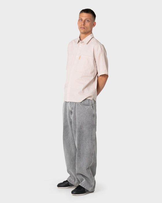 man-wearing-south-central-short-sleeve-shirt-in-ochre