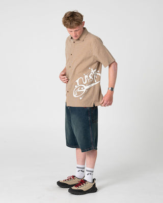 Man wearing Spray N Pray Short Sleeve Shirt in Pinecone