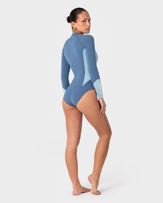 Women wearing Somersault 2mm Long Sleeve Springsuit Wetsuit in Crystal Blue
