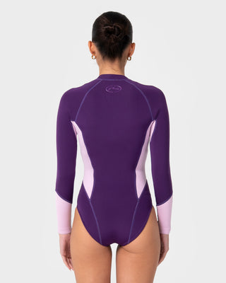 Women wearing Somersault 2mm Long Sleeve Springsuit Wetsuit in Mulberry Wave
