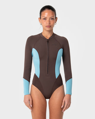 Women wearing Somersault 2mm Long Sleeve Springsuit Wetsuit in Turquoise Bay