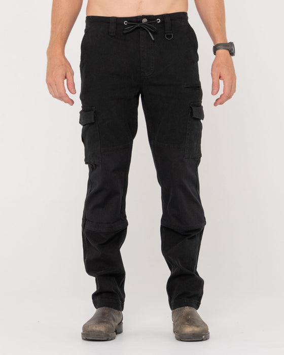 man-wearing-obligation-cargo-pant-in-black