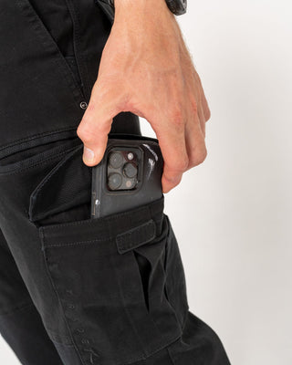 Man wearing Obligation Cargo Pant in Black