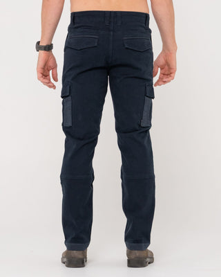 Man wearing Obligation Cargo Pant in Navy Blue