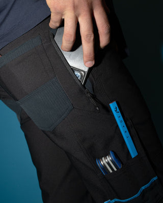 Man wearing Tr245 9 Pocket Stretch Work Pant in Black