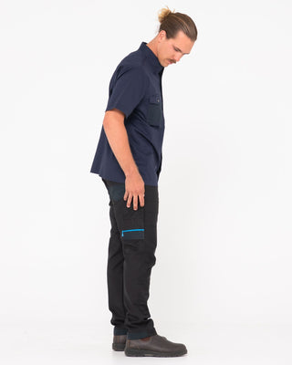 Man wearing Tr245 9 Pocket Stretch Work Pant in Black