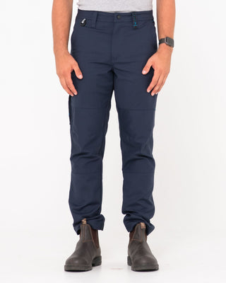 Man wearing Tr245 9 Pocket Stretch Work Pant in True Navy
