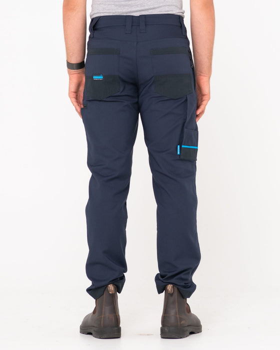 man-wearing-tr245-9-pocket-stretch-work-pant-in-true-navy