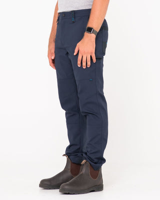 Man wearing Tr245 9 Pocket Stretch Work Pant in True Navy