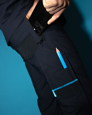 Man wearing Tr245 9 Pocket Stretch Work Pant in True Navy