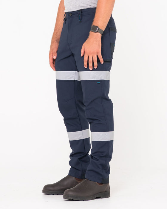 man-wearing-tr245r-9-pocket-stretch-pant-reflect-in-true-navy