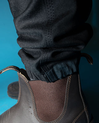 Man wearing Tr246 9 Pocket Stretch Work Pant Cuffed in True Navy