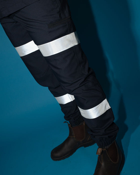 man-wearing-tr246r-9-pkt-stretch-cuff-pant-reflect-in-true-navy