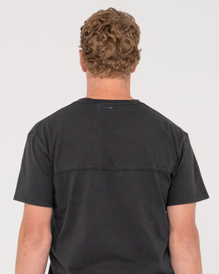 Man wearing Elbow Grease Short Sleeve Tee in Black