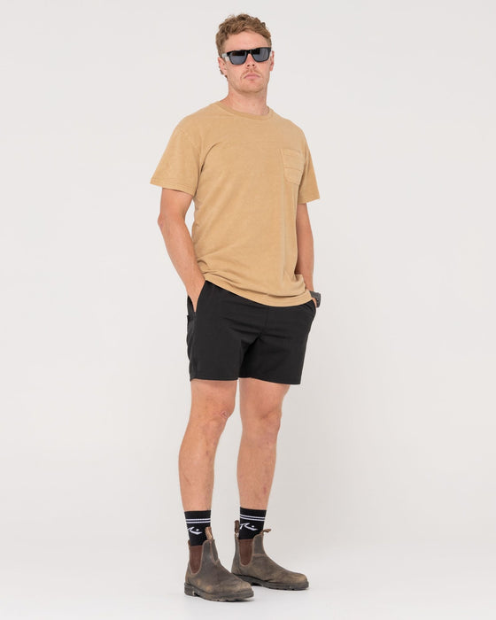 man-wearing-elbow-grease-short-sleeve-tee-in-khaki