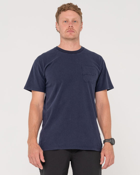 man-wearing-elbow-grease-short-sleeve-tee-in-navy-blue