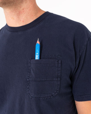 Man wearing Elbow Grease Short Sleeve Tee in Navy Blue