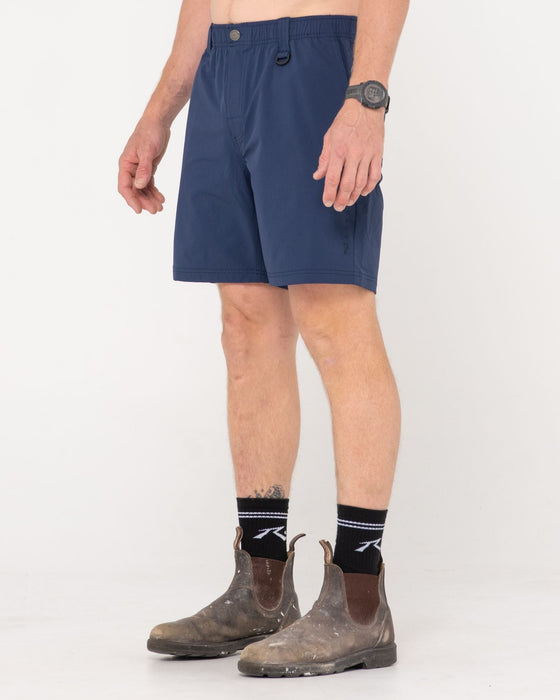 man-wearing-powerweave-quick-dry-work-short-in-navy-blue