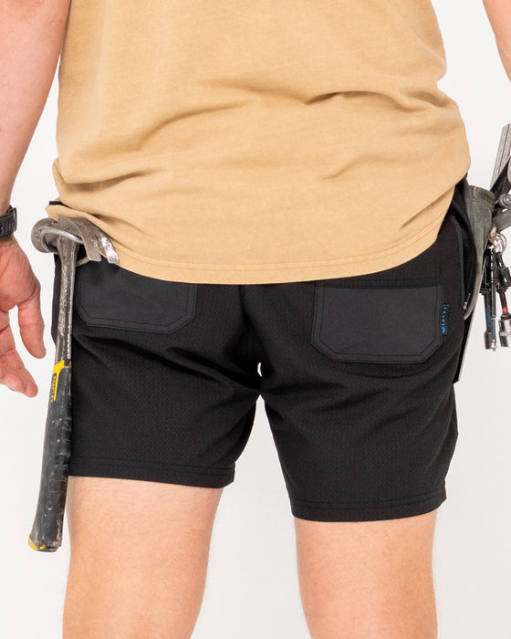 man-wearing-surf2site-quick-dry-elastic-work-short-in-black