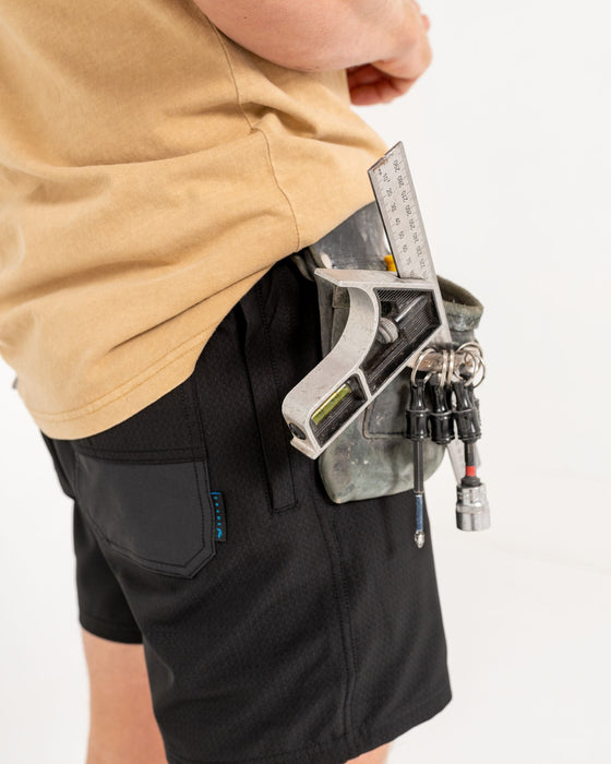 man-wearing-surf2site-quick-dry-elastic-work-short-in-black