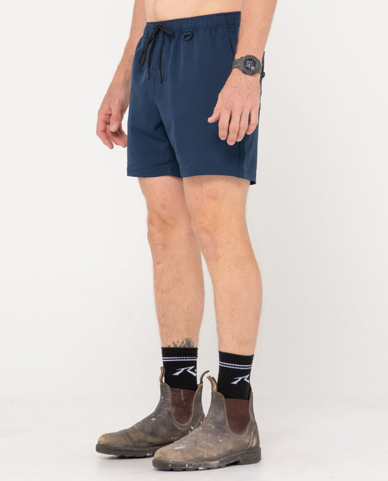 man-wearing-surf2site-quick-dry-elastic-work-short-in-navy-blue