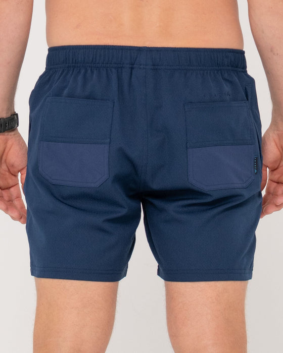 man-wearing-surf2site-quick-dry-elastic-work-short-in-navy-blue