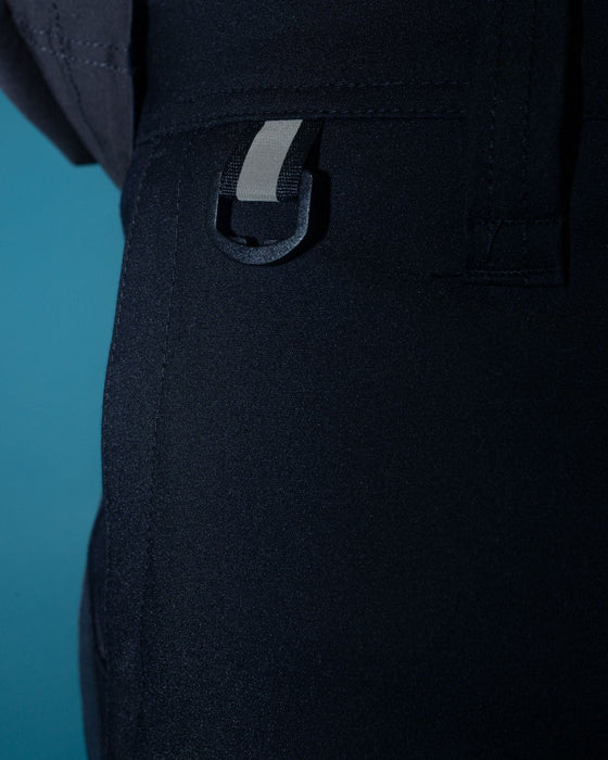 man-wearing-tr400-9-pocket-stretch-short-in-true-navy