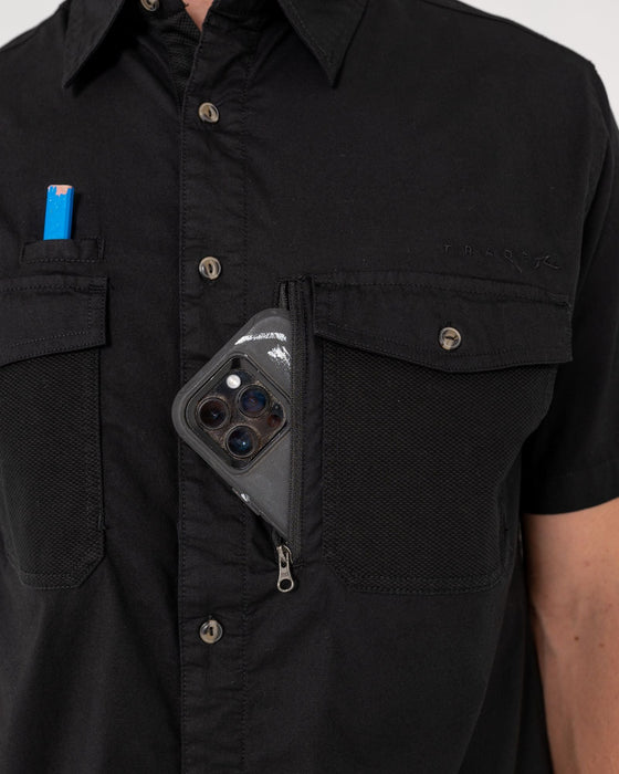 man-wearing-pressure-short-sleeve-shirt-in-black