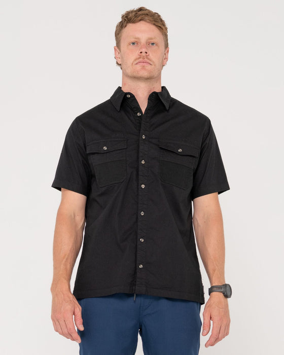 man-wearing-grindstones-short-sleeve-shirt-in-black