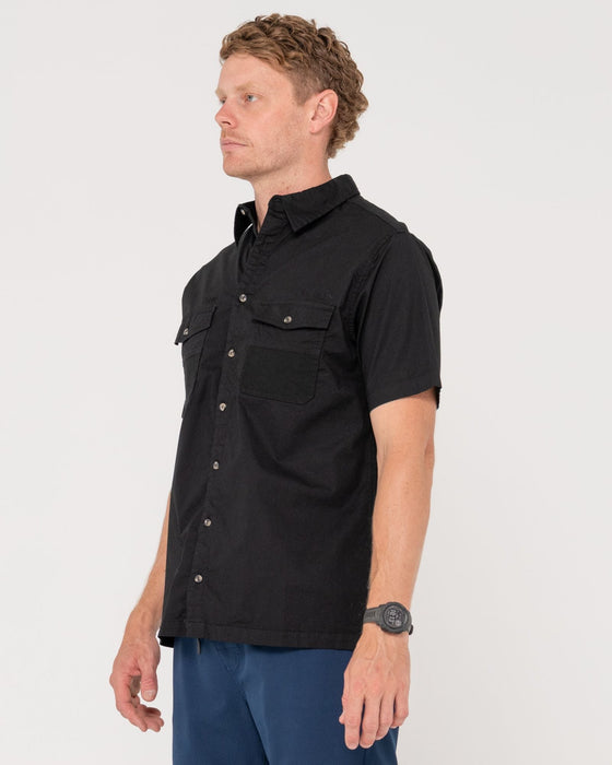man-wearing-grindstones-short-sleeve-shirt-in-black