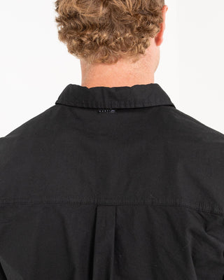 Man wearing Grindstones Short Sleeve Shirt in Black