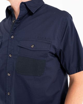 Man wearing Grindstones Short Sleeve Shirt in Navy Blue