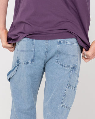 Man wearing Dungaree Denim 5 Pkt Pant in Ash Blue