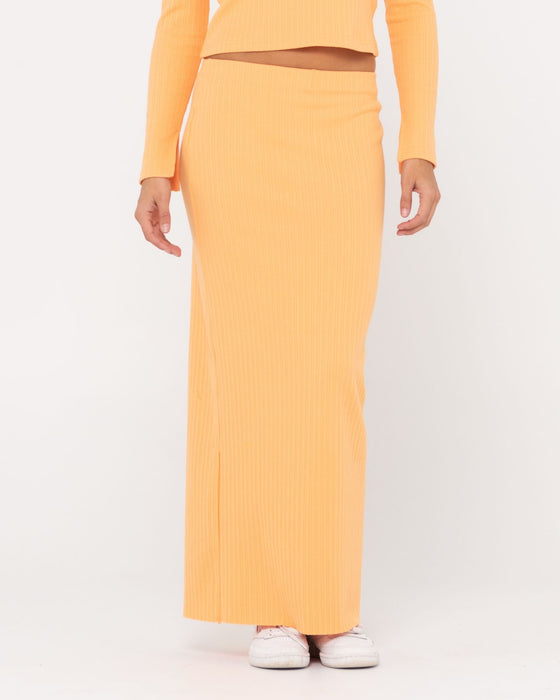 woman-wearing-scarlett-maxi-skirt-in-apricot-blush