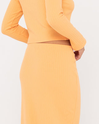 Woman wearing Scarlett Maxi Skirt in Apricot Blush