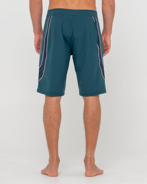 man-wearing-charger-boardshort-in-green-gables