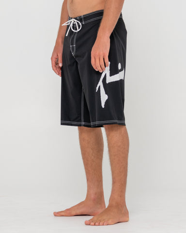 Man wearing Fixed Competition Revolution Boardshort in Black