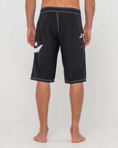 Man wearing Fixed Competition Revolution Boardshort in Black