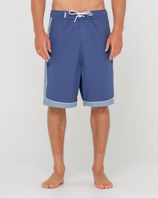 Man wearing Panel Crank Boardshort in Atlantic Blue