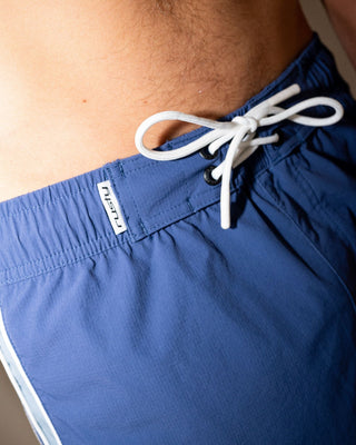 Man wearing Panel Crank Boardshort in Atlantic Blue