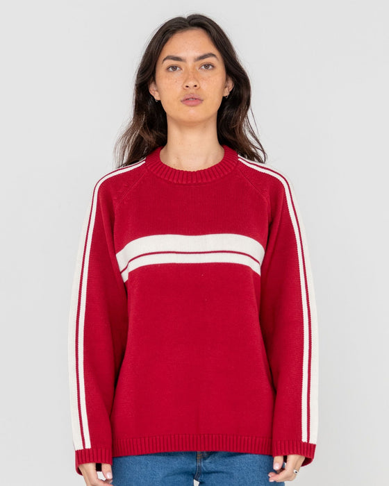 woman-wearing-white-lines-long-sleeve-crew-neck-knit-in-rhubarb