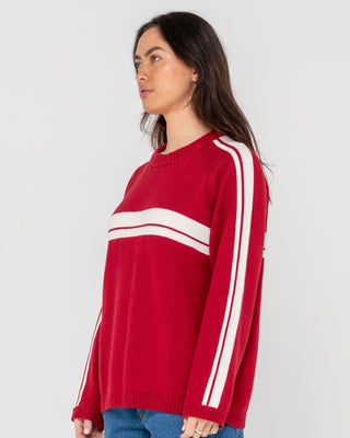 Woman wearing White Lines Long Sleeve Crew Neck Knit in Rhubarb