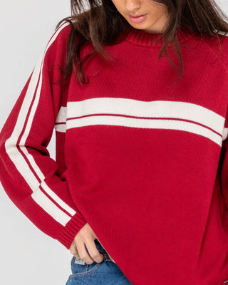 Woman wearing White Lines Long Sleeve Crew Neck Knit in Rhubarb