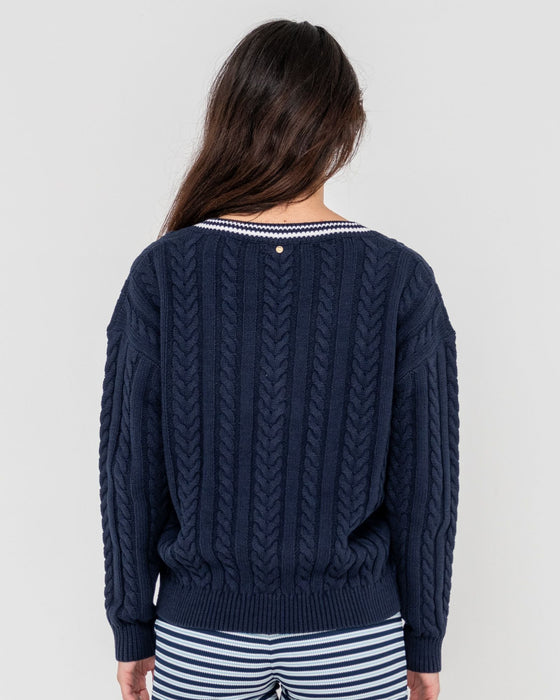 woman-wearing-oxford-oversized-vee-neck-knit-in-navy-blue