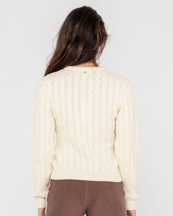 woman-wearing-collegiate-long-sleeve-vee-neck-knit-in-snow