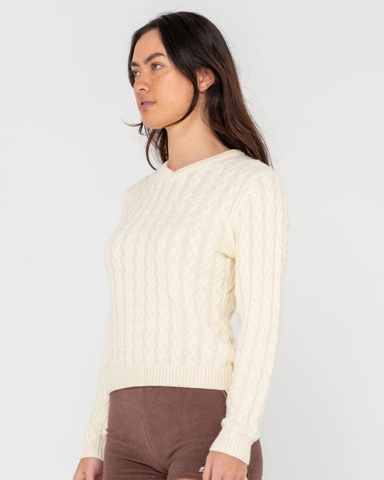 woman-wearing-collegiate-long-sleeve-vee-neck-knit-in-snow