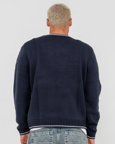 Man wearing Venom Vee Neck Knitted Crew in Blue