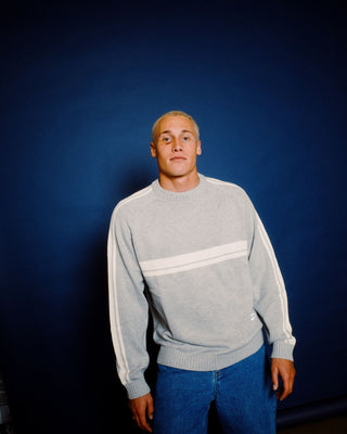 Man wearing White Lines 2.0 Knitted Crew in Grey Marle