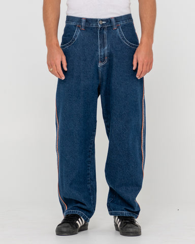 Man wearing Flip Daddy 2.0 Jean - Deep Sea Blue in Blue