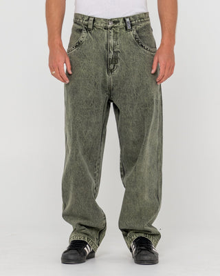 Man wearing R Dot Baggy Jean in Overdyed Green